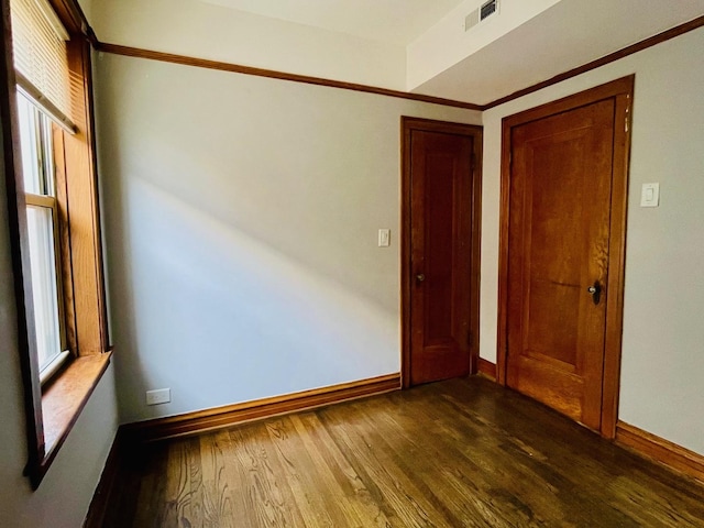 4623 S Harding Ave, Chicago, IL 60632 - unfurnished room with dark wood-style flooring and baseboards