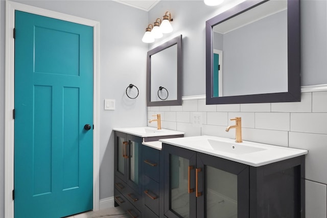 bathroom with two vanities and decorative backsplash