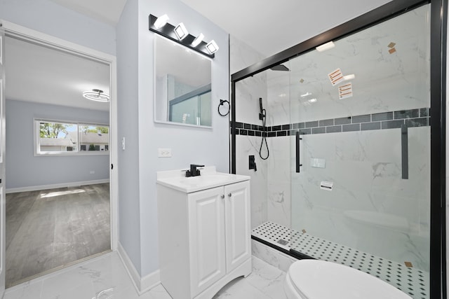 631 Fenton Ave, Romeoville, IL 60446 - full bath featuring marble finish flooring, toilet, a marble finish shower, baseboards, and vanity