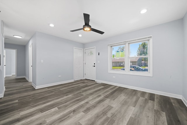 631 Fenton Ave, Romeoville, IL 60446 - unfurnished living room with ceiling fan, baseboards, wood finished floors, and recessed lighting