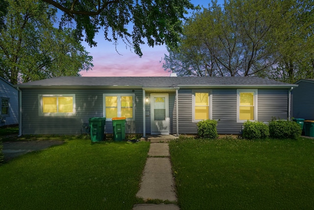 631 Fenton Ave, Romeoville, IL 60446 - view of front of home with a front lawn