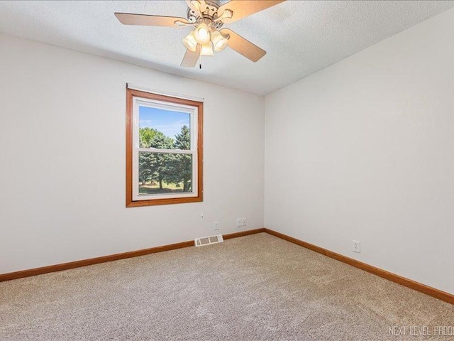 48W142 Milnamow Dr, Maple Park, IL 60151 - spare room with carpet flooring, a ceiling fan, and a textured ceiling