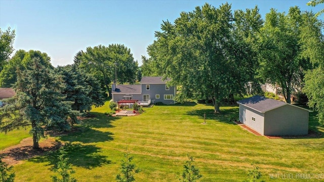 48W142 Milnamow Dr, Maple Park, IL 60151 - view of grassy yard featuring an outbuilding and a deck
