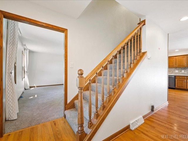 48W142 Milnamow Dr, Maple Park, IL 60151 - stairway featuring wood finished floors and recessed lighting