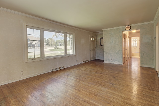512 S Hebbard St, Joliet, IL 60433 - empty room featuring wood finished floors, ornamental molding, and baseboards