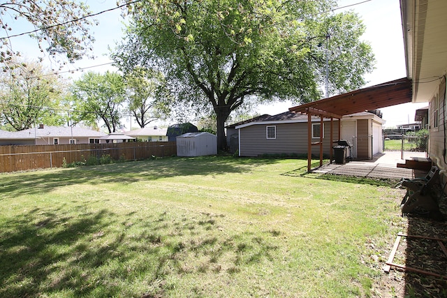 512 S Hebbard St, Joliet, IL 60433 - view of yard featuring a storage unit and an outdoor structure