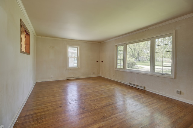 512 S Hebbard St, Joliet, IL 60433 - empty room featuring wood finished floors, plenty of natural light, crown molding, and baseboards