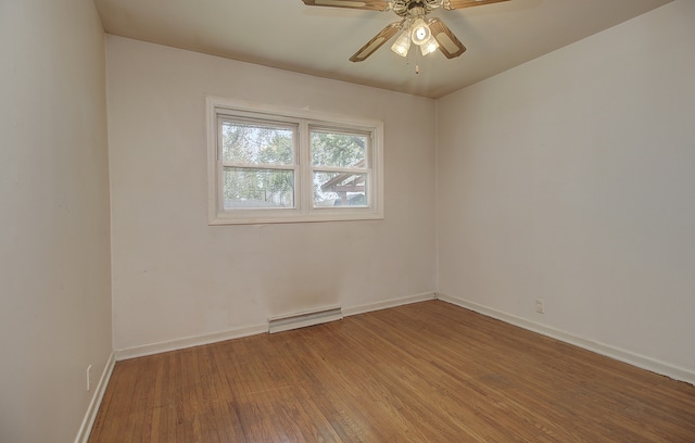 512 S Hebbard St, Joliet, IL 60433 - unfurnished room with wood finished floors, baseboards, and a ceiling fan