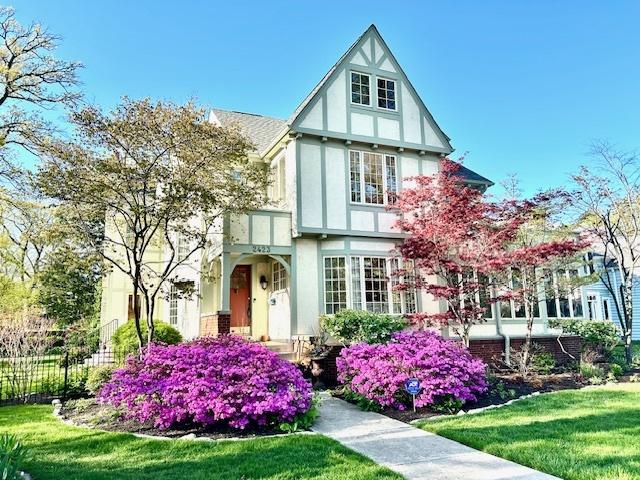 2423 Harrison St, Evanston, IL 60201 - tudor house featuring stucco siding