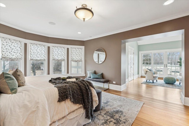 2423 Harrison St, Evanston, IL 60201 - bedroom featuring baseboards, crown molding, light wood-style flooring, recessed lighting, and access to exterior
