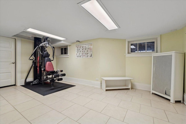 2423 Harrison St, Evanston, IL 60201 - exercise area featuring baseboards, tile patterned flooring, and a heating unit