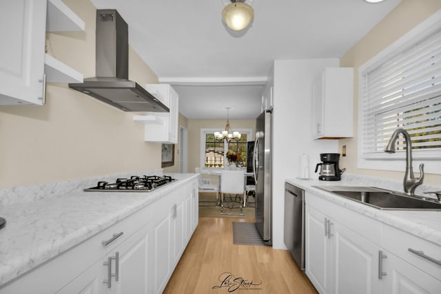 3816 N Washington St, Westmont, IL 60559 - kitchen with stainless steel appliances, island range hood, a chandelier, and white cabinets