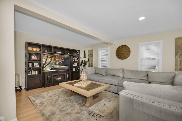 3816 N Washington St, Westmont, IL 60559 - living area featuring light wood-style flooring, beam ceiling, recessed lighting, and a glass covered fireplace