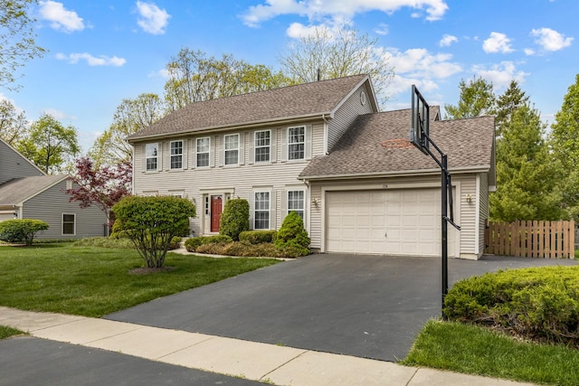 726 W Trl, Grayslake, IL 60030 - colonial inspired home with asphalt driveway, an attached garage, and a shingled roof
