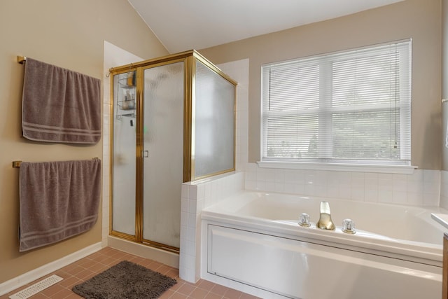 726 W Trl, Grayslake, IL 60030 - full bathroom featuring a shower stall, a garden tub, lofted ceiling, and tile patterned flooring