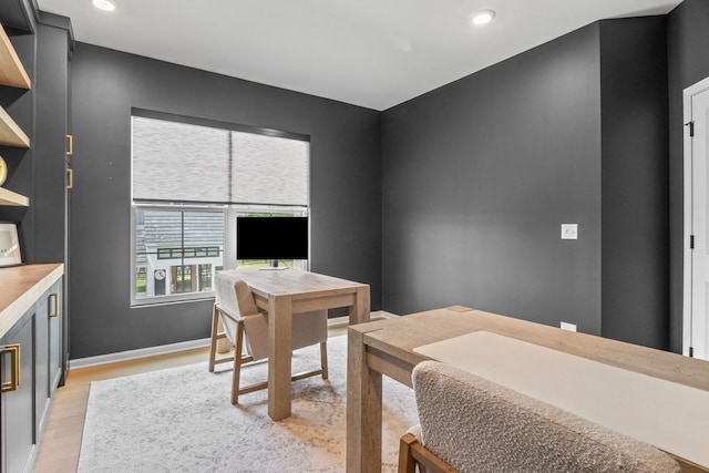 office with light wood-type flooring, recessed lighting, and baseboards