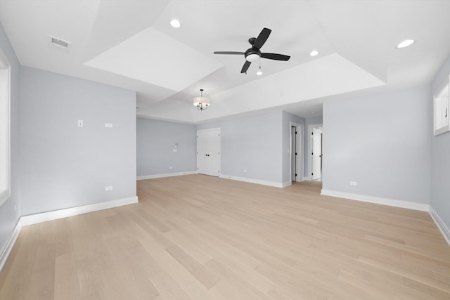 622 S Euclid Ave, Elmhurst, IL 60126 - unfurnished room featuring a raised ceiling, baseboards, recessed lighting, ceiling fan, and light wood finished floors