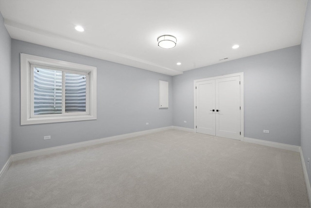 622 S Euclid Ave, Elmhurst, IL 60126 - unfurnished bedroom featuring light colored carpet, recessed lighting, baseboards, and a closet