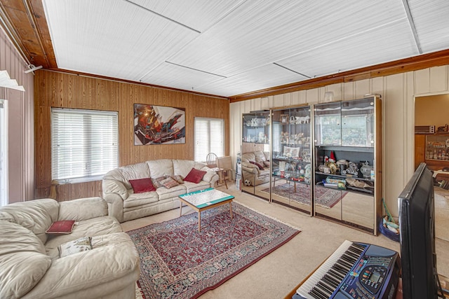 2748 Bellwood Ave, Melrose Park, IL 60164 - living room featuring healthy amount of natural light, carpet flooring, wooden walls, and ornamental molding