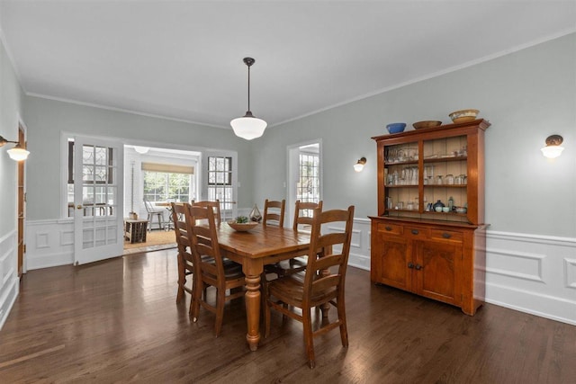 794 Dean Ave, Highland Park, IL 60035 - dining room with a decorative wall, ornamental molding, dark wood-type flooring, and wainscoting