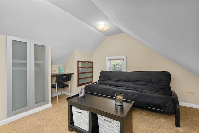 794 Dean Ave, Highland Park, IL 60035 - living area featuring light carpet, lofted ceiling, and baseboards