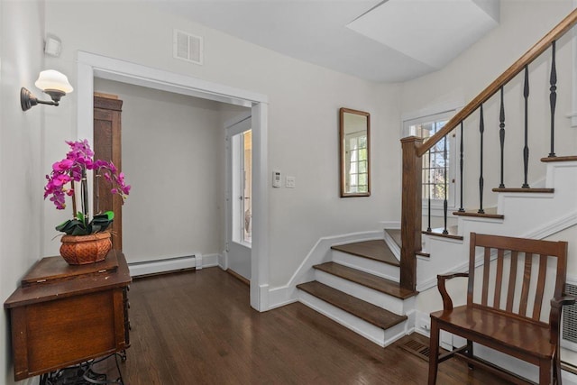794 Dean Ave, Highland Park, IL 60035 - entryway with a baseboard heating unit, wood finished floors, stairway, and baseboards