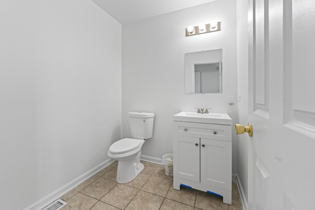 16215 S Trumbull Ave S, Markham, IL 60428 - bathroom featuring tile patterned floors, toilet, baseboards, and vanity