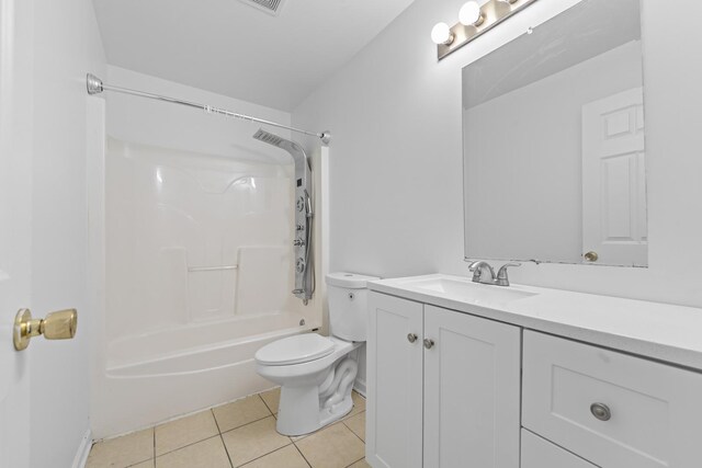 16215 S Trumbull Ave S, Markham, IL 60428 - bathroom with tile patterned flooring, toilet, vanity, and shower / bathtub combination