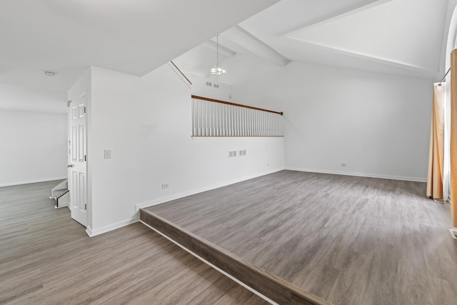 16215 S Trumbull Ave S, Markham, IL 60428 - unfurnished living room featuring wood finished floors, baseboards, and a chandelier