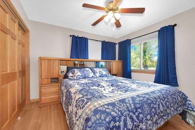 23424 W Winston Ave, Plainfield, IL 60586 - bedroom featuring wood finished floors, a closet, ceiling fan, and baseboards