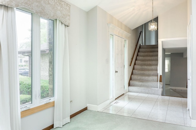 1116 N Old Fence Rd, Addison, IL 60101 - staircase with a chandelier, healthy amount of natural light, and carpet floors