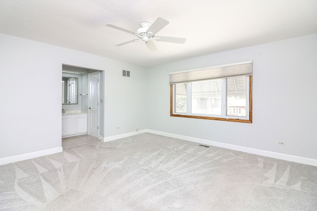 1116 N Old Fence Rd, Addison, IL 60101 - spare room with light carpet and a ceiling fan