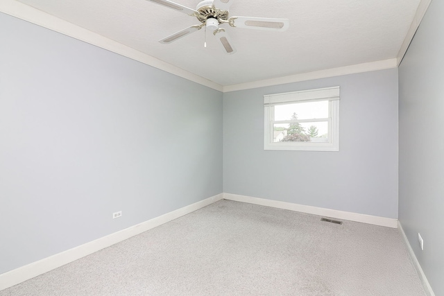 1116 N Old Fence Rd, Addison, IL 60101 - spare room featuring carpet flooring, ornamental molding, and ceiling fan
