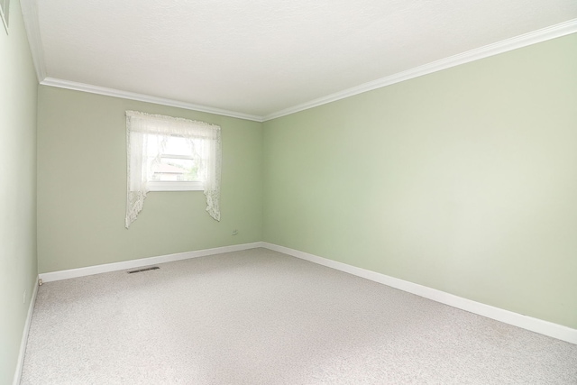 1116 N Old Fence Rd, Addison, IL 60101 - carpeted empty room with crown molding and baseboards
