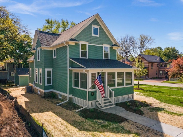 426 S Jefferson St, Batavia, IL 60510 - victorian house with entry steps, roof with shingles, and central AC