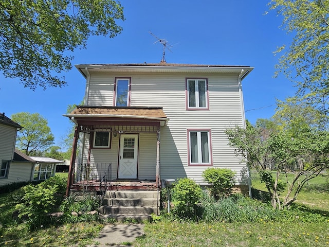 back of house with covered porch