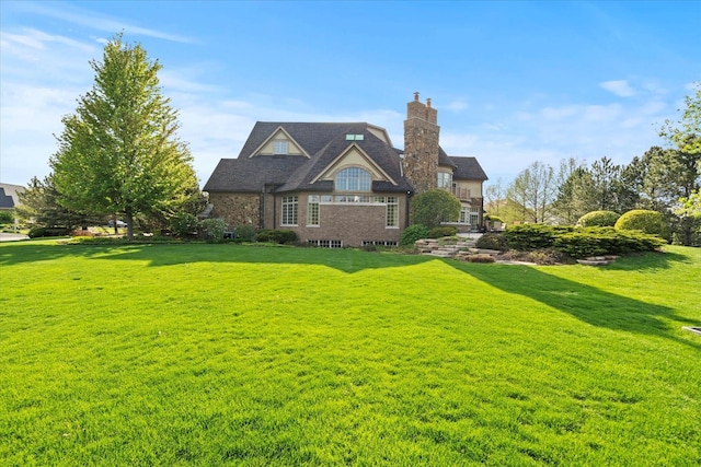 137 Singletree Rd, Orland Park, IL 60467 - view of front of home featuring a front yard and a chimney
