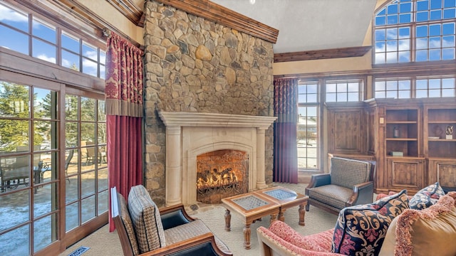 137 Singletree Rd, Orland Park, IL 60467 - living area featuring a warm lit fireplace, healthy amount of natural light, a towering ceiling, and carpet