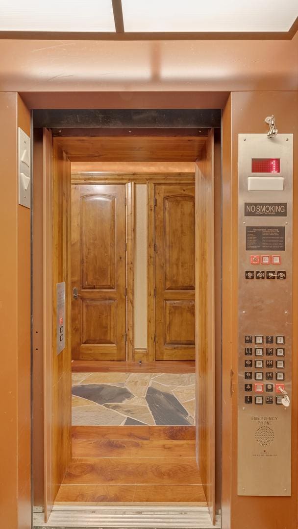 137 Singletree Rd, Orland Park, IL 60467 - elevator with wood finished floors