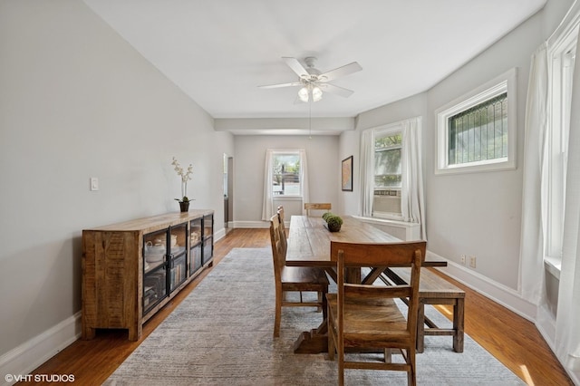 6329 N Hermitage Ave, Chicago, IL 60660 - dining area with a ceiling fan, baseboards, and light wood-type flooring