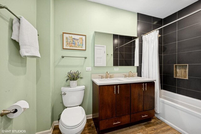 6329 N Hermitage Ave, Chicago, IL 60660 - bathroom featuring wood finished floors, toilet, shower / bath combination with curtain, and double vanity