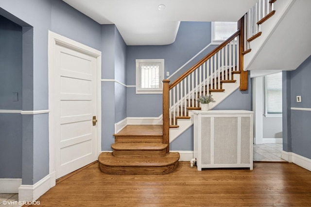 6329 N Hermitage Ave, Chicago, IL 60660 - entryway featuring wood finished floors, stairs, and baseboards