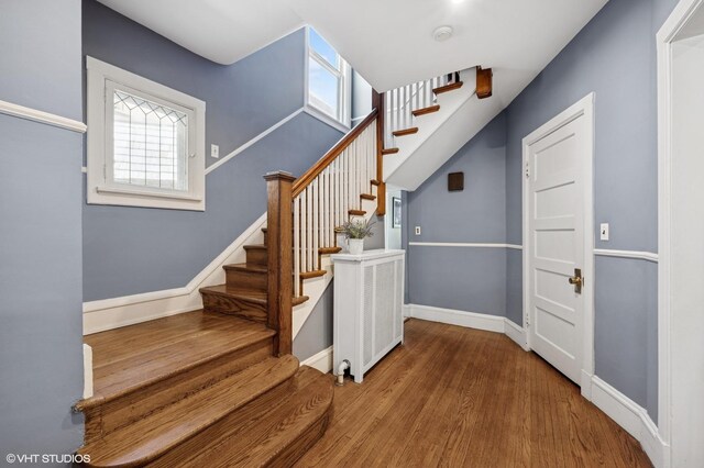 6329 N Hermitage Ave, Chicago, IL 60660 - stairs featuring wood finished floors and baseboards