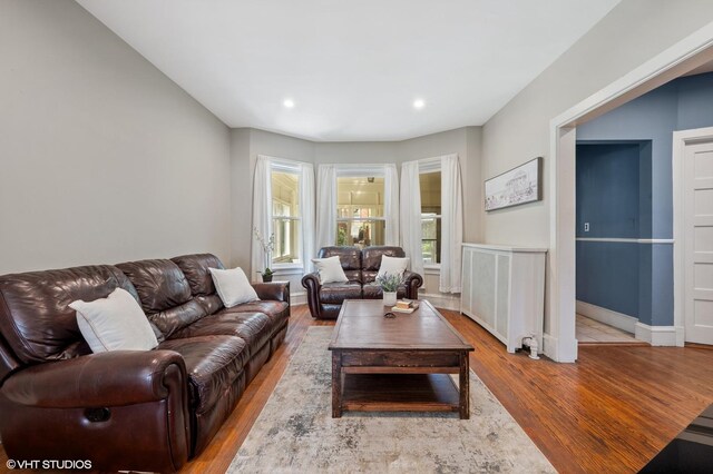 6329 N Hermitage Ave, Chicago, IL 60660 - living area with wood finished floors, recessed lighting, and baseboards