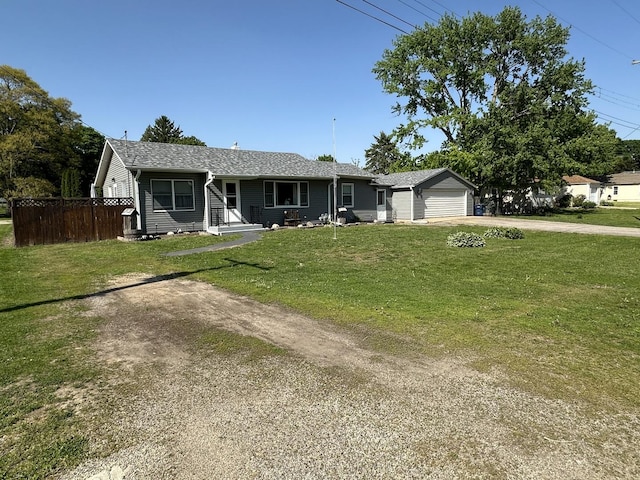 210 W S St, Sheffield, IL 61361 - ranch-style house featuring dirt driveway, a garage, and roof with shingles