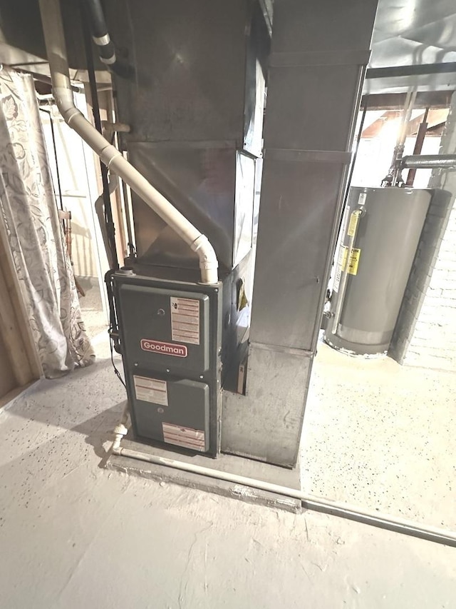 210 W S St, Sheffield, IL 61361 - utility room with water heater and heating unit