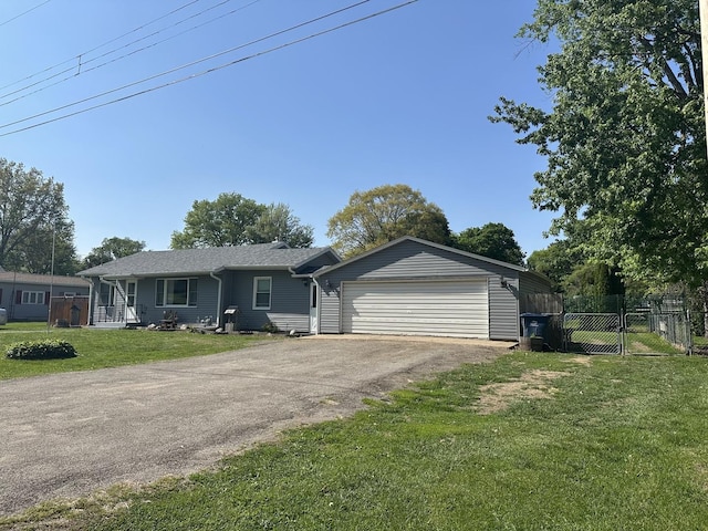 210 W S St, Sheffield, IL 61361 - ranch-style house with asphalt driveway and a garage