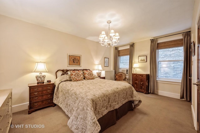 bedroom featuring light carpet, a chandelier, and baseboards