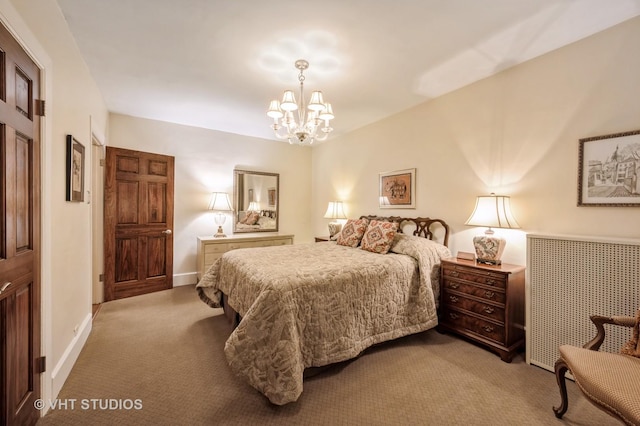 bedroom featuring a chandelier, carpet, and baseboards