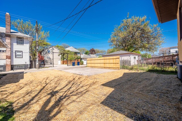 150 S 13th Ave, Maywood, IL 60153 - view of yard with fence and a residential view